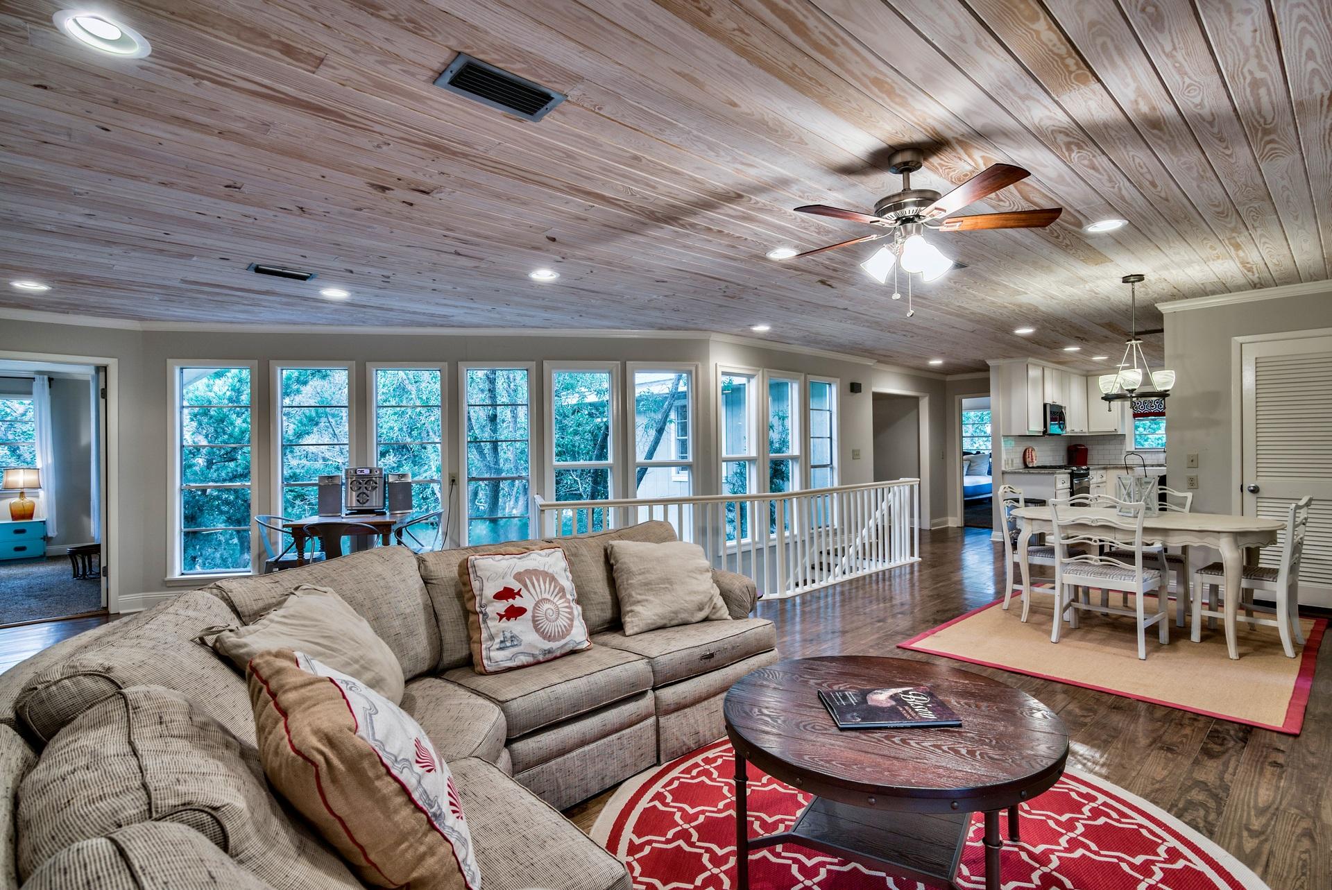 245 Baird Road Santa Rosa Beach, FL 32459 - Photo 4 of 44 a living room with furniture and a large window