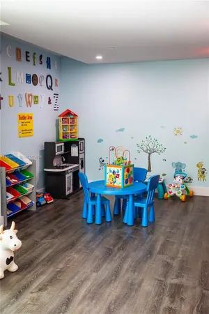 a view of a play room with toys and toys