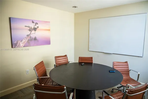 a workspace with furniture and lamp