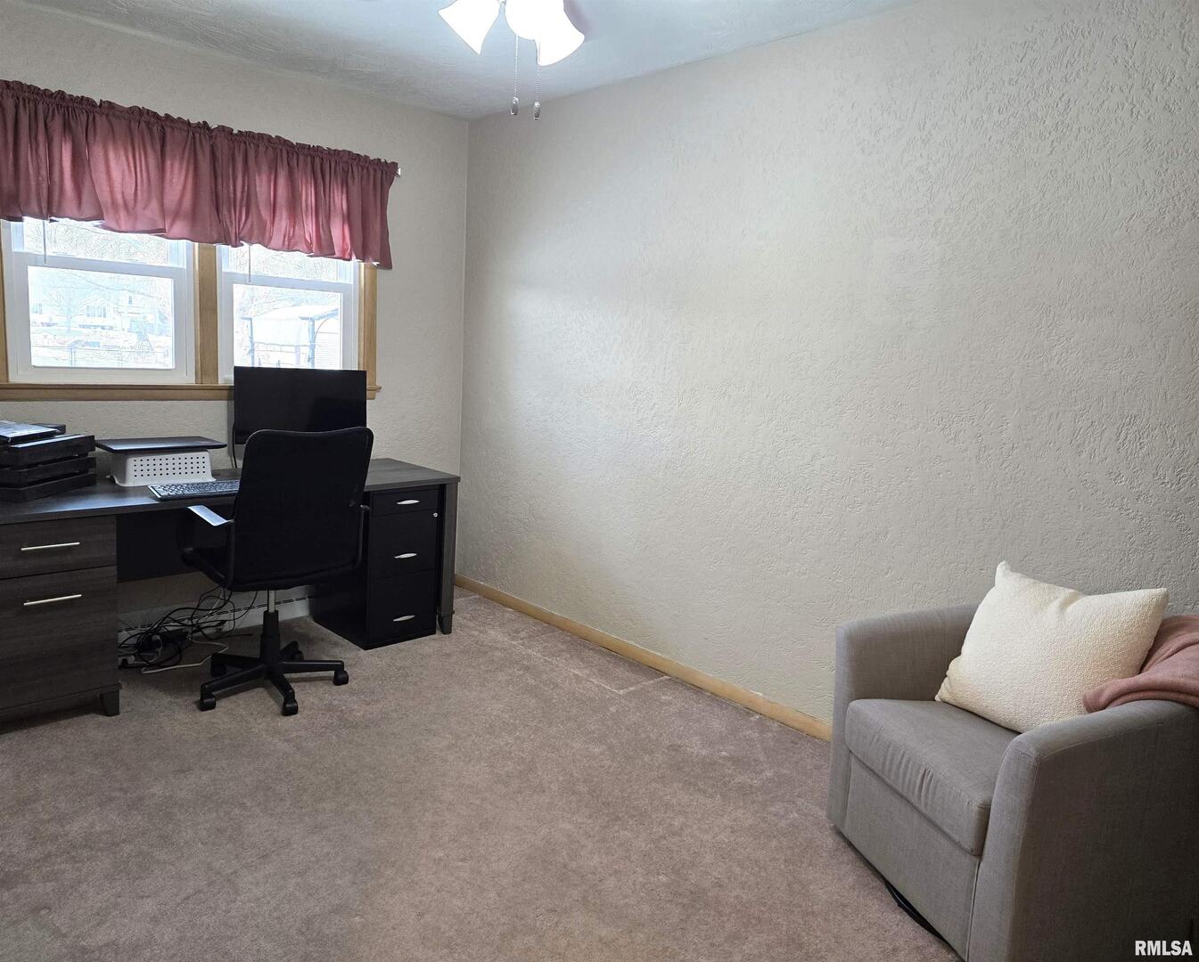 208 North Depot Street Annawan, IL 61234 - Photo 16 of 25 a livingroom with workspace and a window