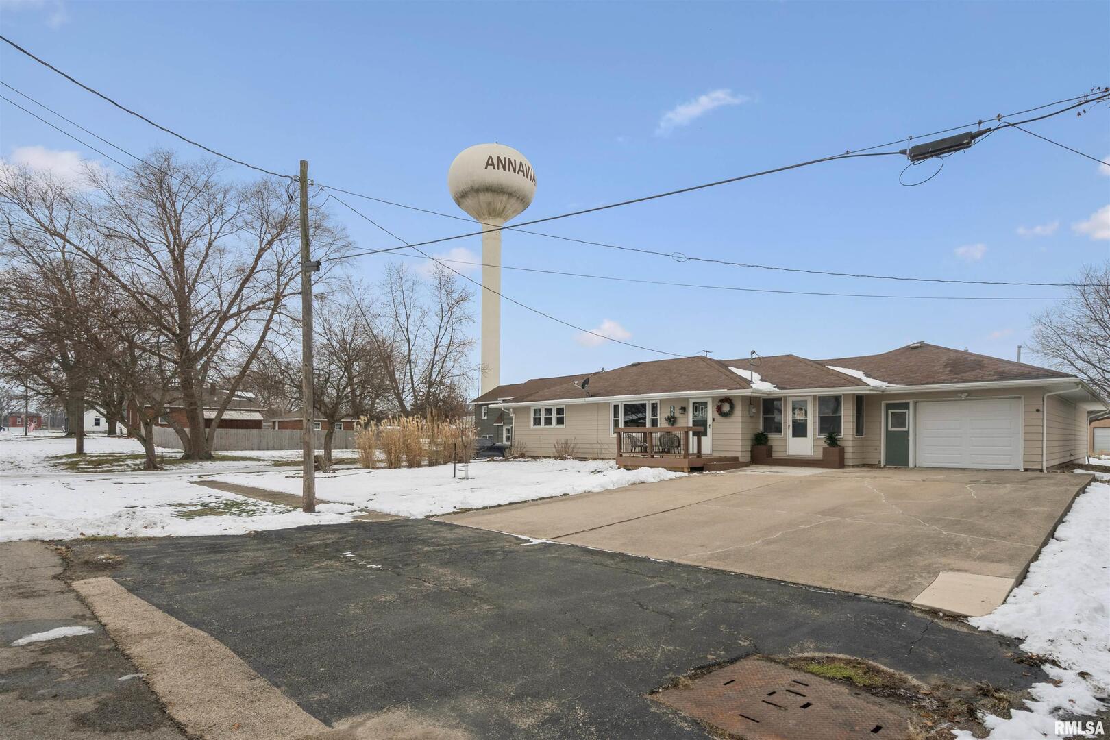 208 North Depot Street Annawan, IL 61234 - Photo 2 of 25 a front view of a house with a yard