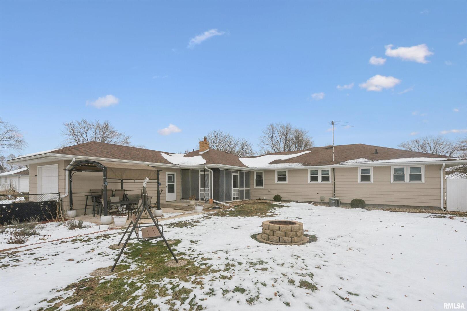 208 North Depot Street Annawan, IL 61234 - Photo 22 of 25 a front view of a house with a yard