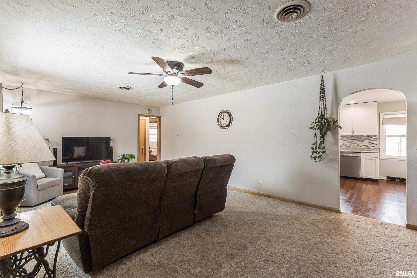 208 North Depot Street Annawan, IL 61234 - Photo 5 of 25 a living room with furniture and a window