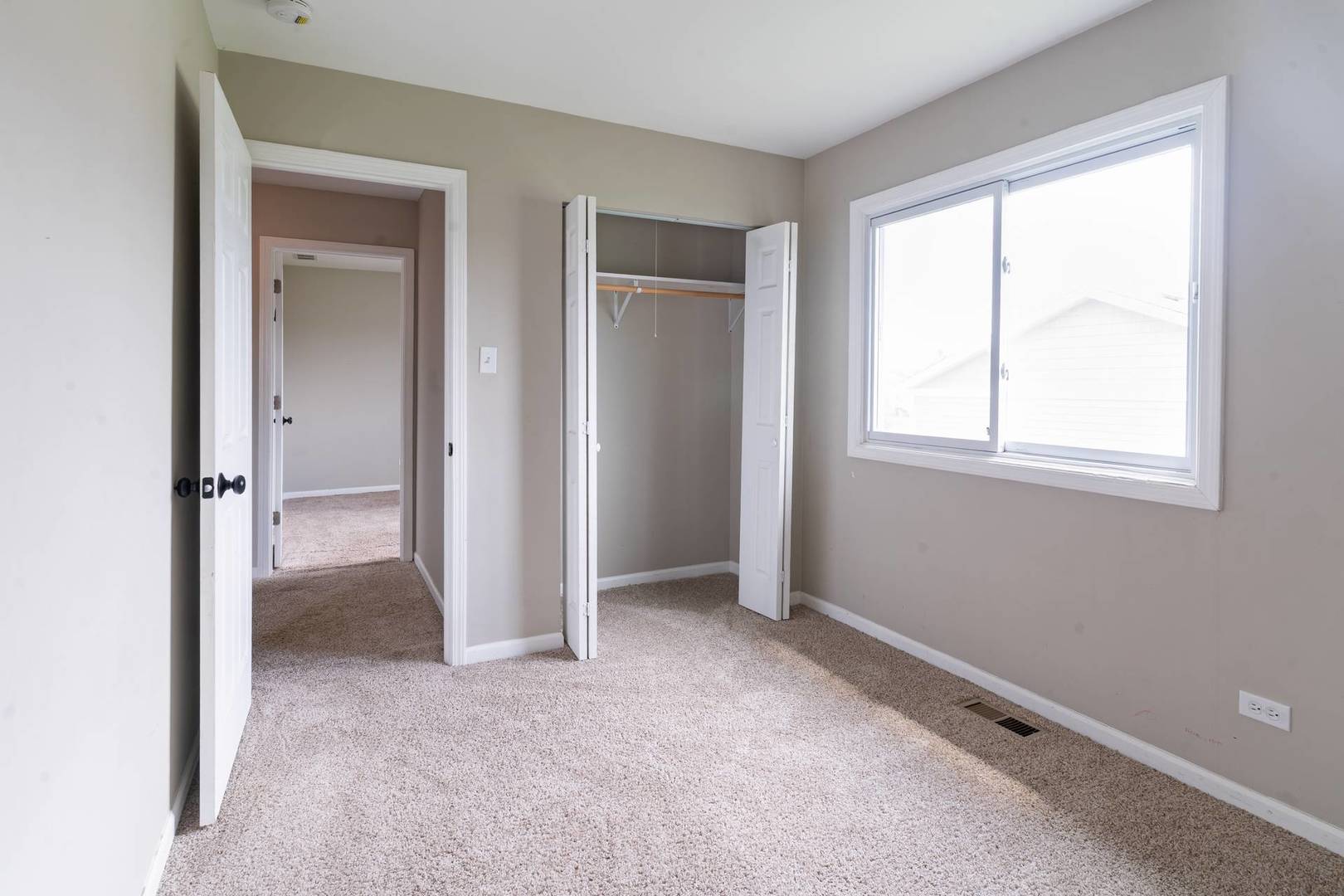 50 Willow Road Matteson, IL 60443 - Photo 15 of 21 a view of an empty room with a window