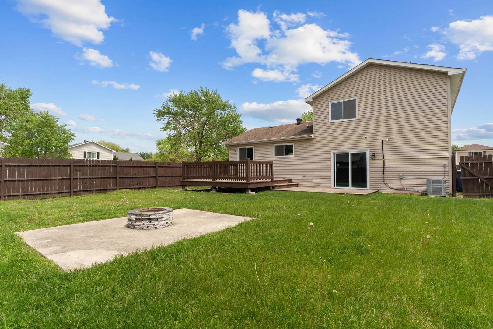 50 Willow Road Matteson, IL 60443 - Photo 21 of 21 a view of a backyard with a garden