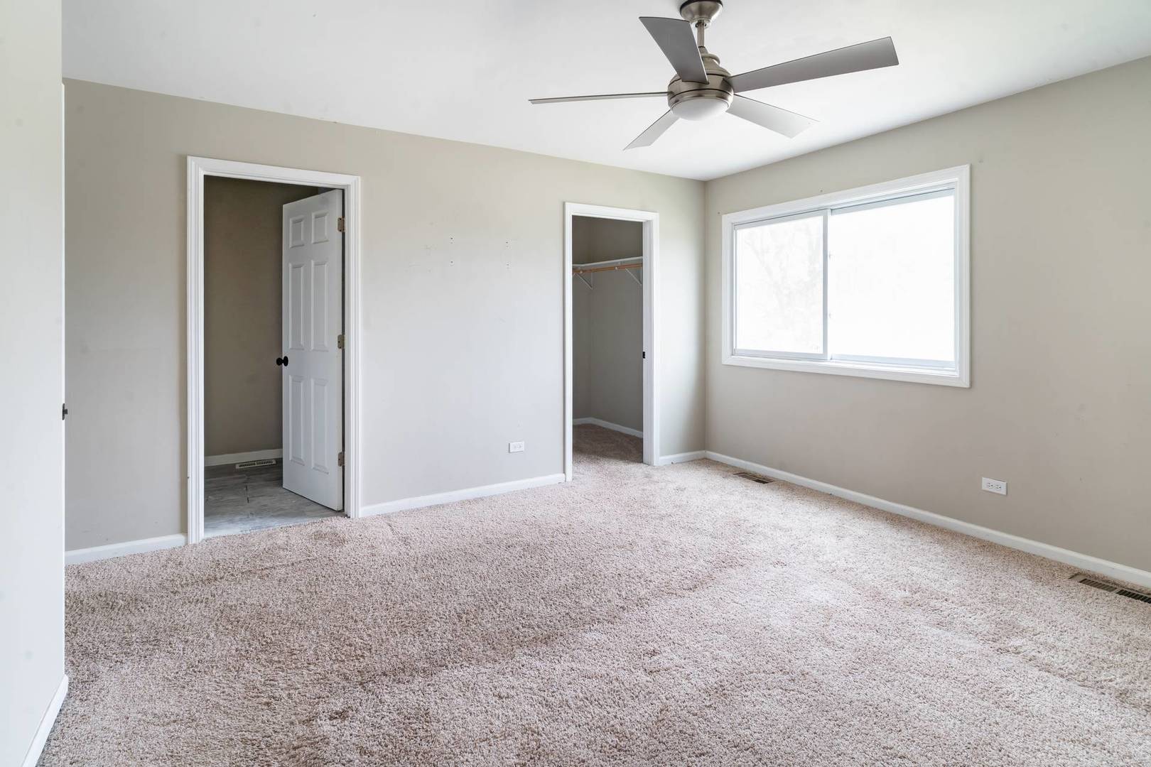 50 Willow Road Matteson, IL 60443 - Photo 6 of 21 a view of an empty room with a window