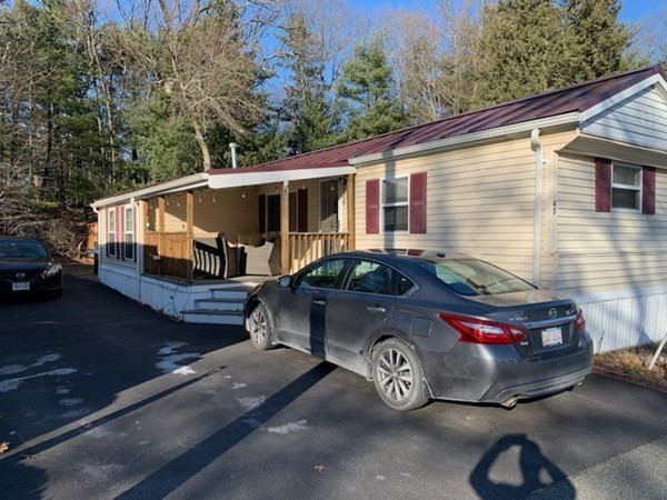 846 Broadway, Unit 45 Saugus, MA 01906 - Photo 1 of 11 a car parked in front of a house