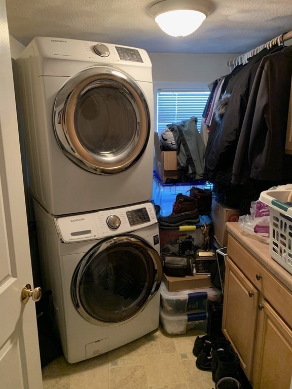 846 Broadway, Unit 45 Saugus, MA 01906 - Photo 9 of 11 a utility room with dryer and washer