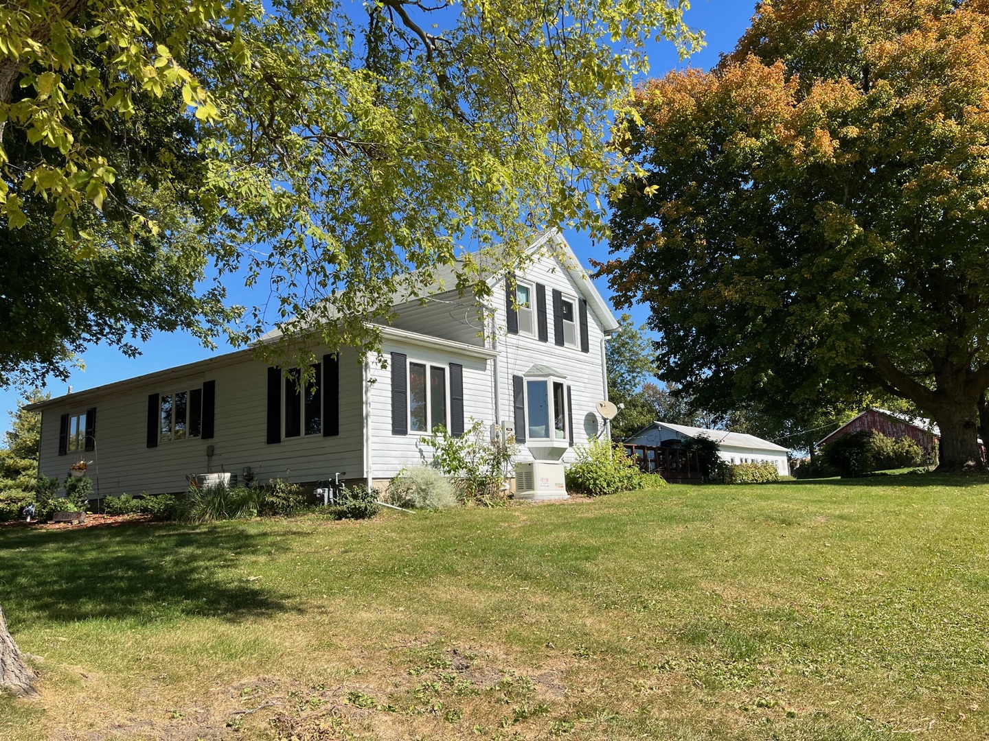 15582 Bishop Road Morrison, IL 61270 - Photo 3 of 28 a front view of house with yard and trees