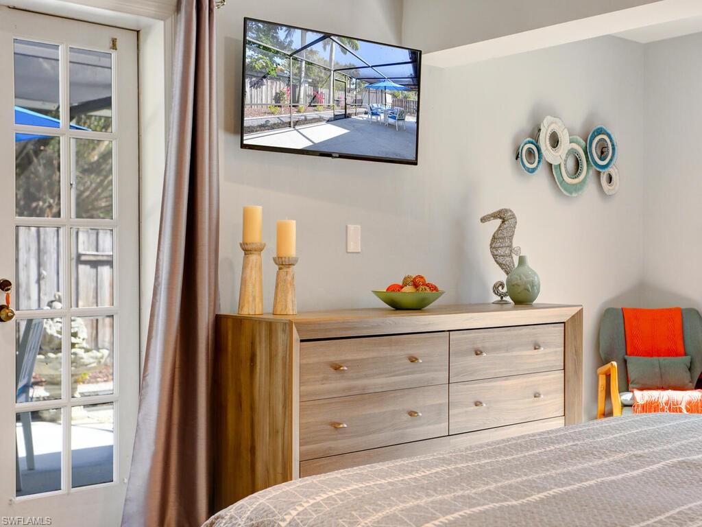 1014 Broad Avenue North Naples, FL 34102 - Photo 19 of 33 a view of dresser and window