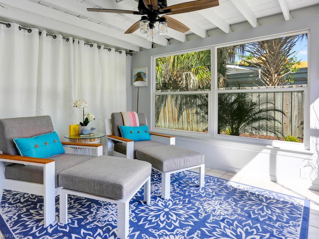 1014 Broad Avenue North Naples, FL 34102 - Photo 27 of 33 a living room with furniture and a large window