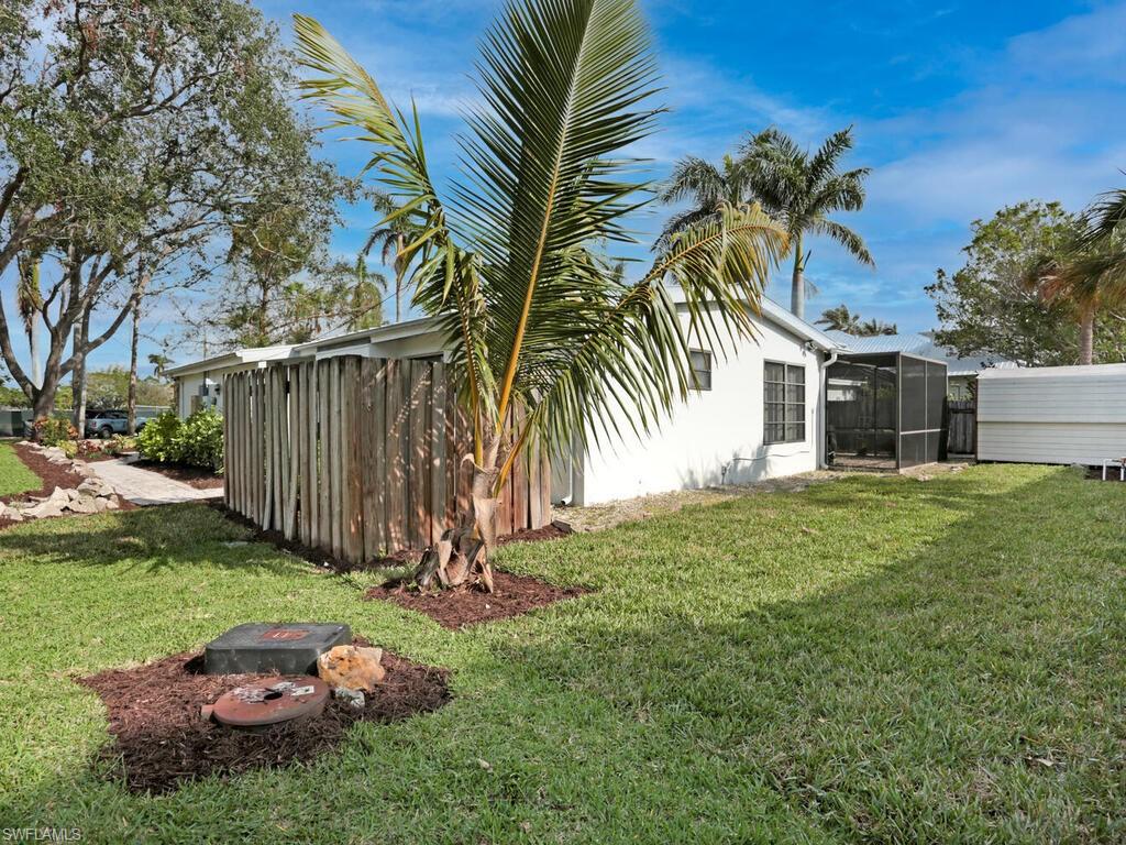 1014 Broad Avenue North Naples, FL 34102 - Photo 7 of 33 a view of a backyard with a garden