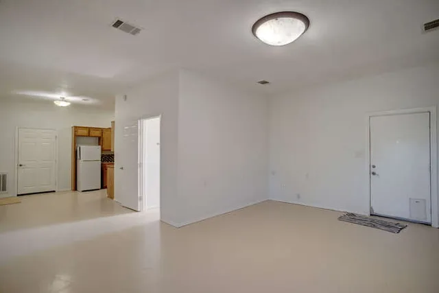 a kitchen with a refrigerator a sink and dishwasher
