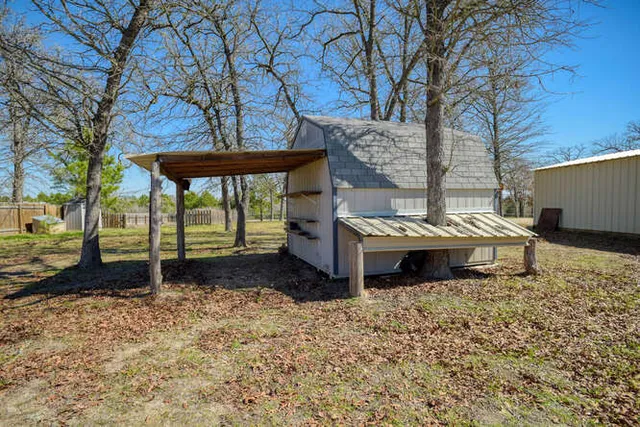 a backyard of a house with lots of green space