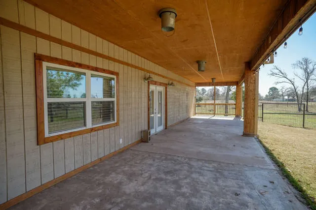 a view of a room with a large window