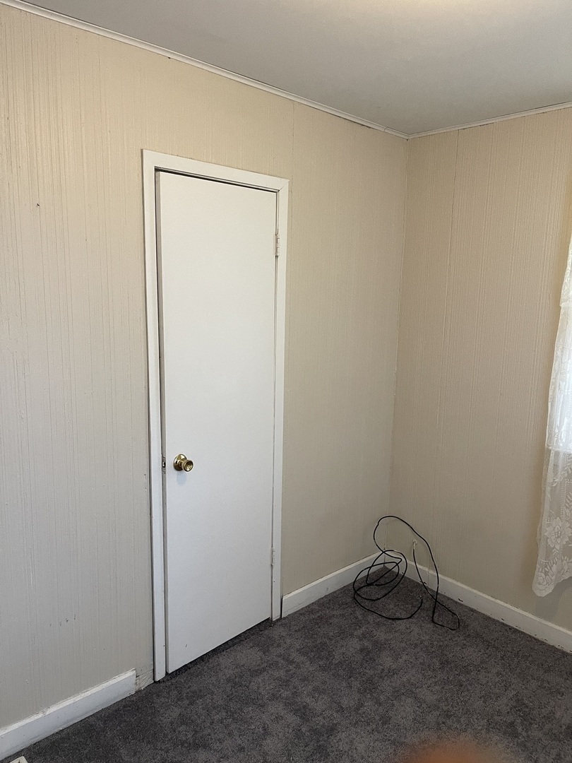 5420 West Main Street Monee, IL 60449 - Photo 11 of 16 a room with a bench