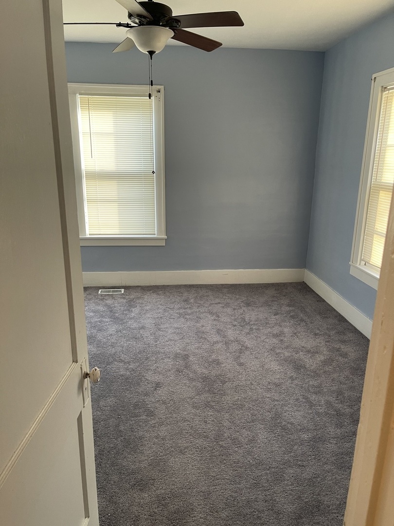 5420 West Main Street Monee, IL 60449 - Photo 10 of 16 an empty room with a window