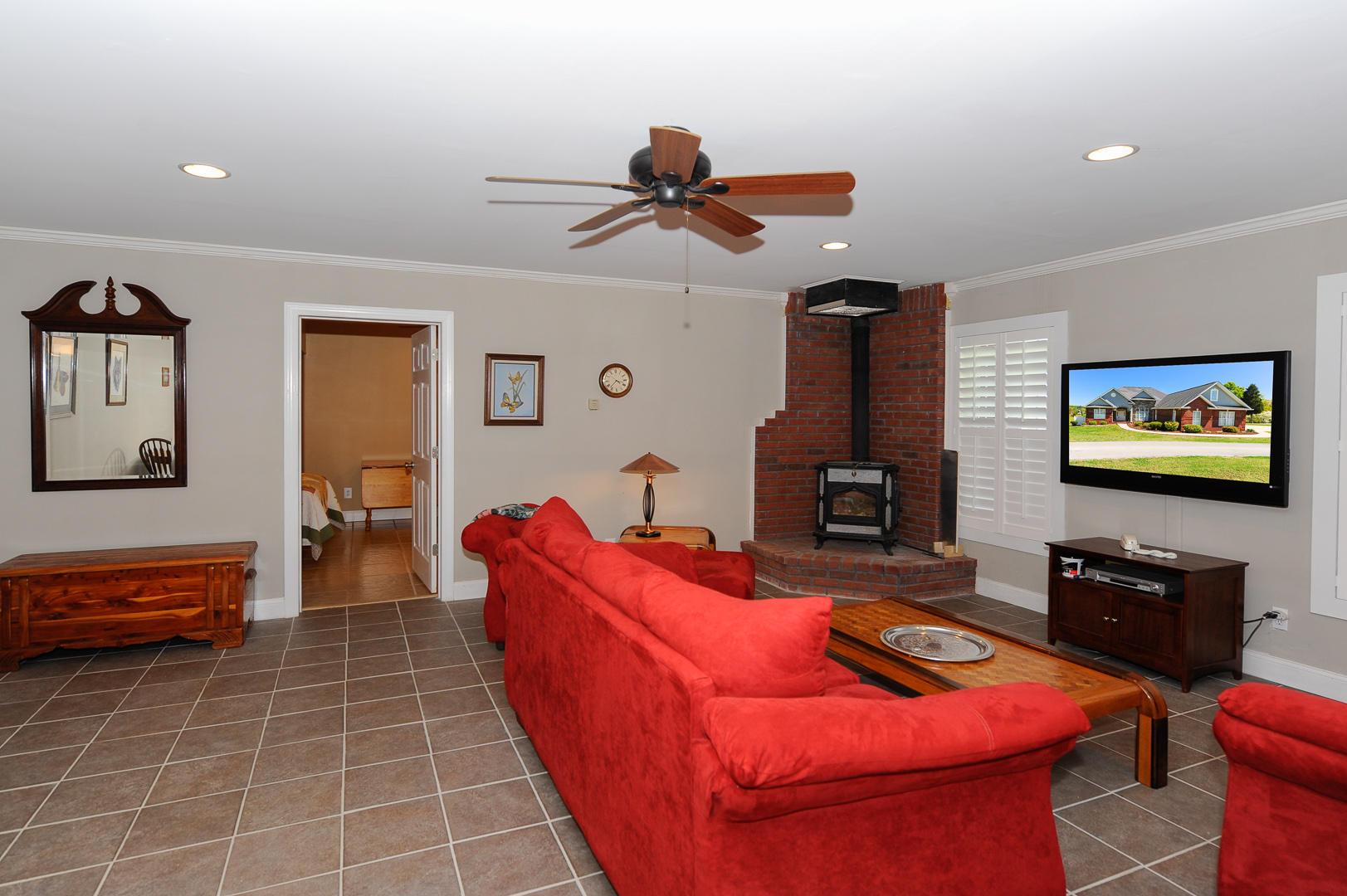 2010 Crest Road Maryville, TN 37804 - Photo 22 of 37 LOWER LEVEL REC ROOM W/ SOAP STONE STOVE
