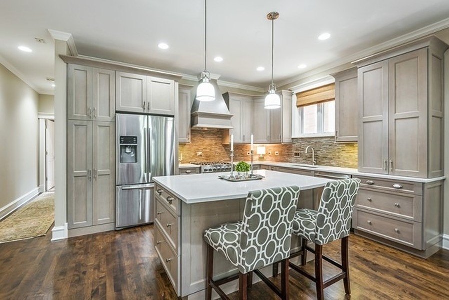 1365 North Mohawk Street, Unit 1S Chicago, IL 60610 - Photo 2 of 15 a kitchen with stainless steel appliances granite countertop a refrigerator a sink and a stove