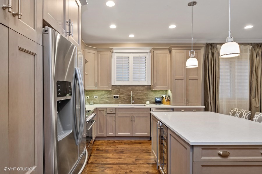 1365 North Mohawk Street, Unit 1S Chicago, IL 60610 - Photo 4 of 15 a kitchen with a sink appliances and cabinets