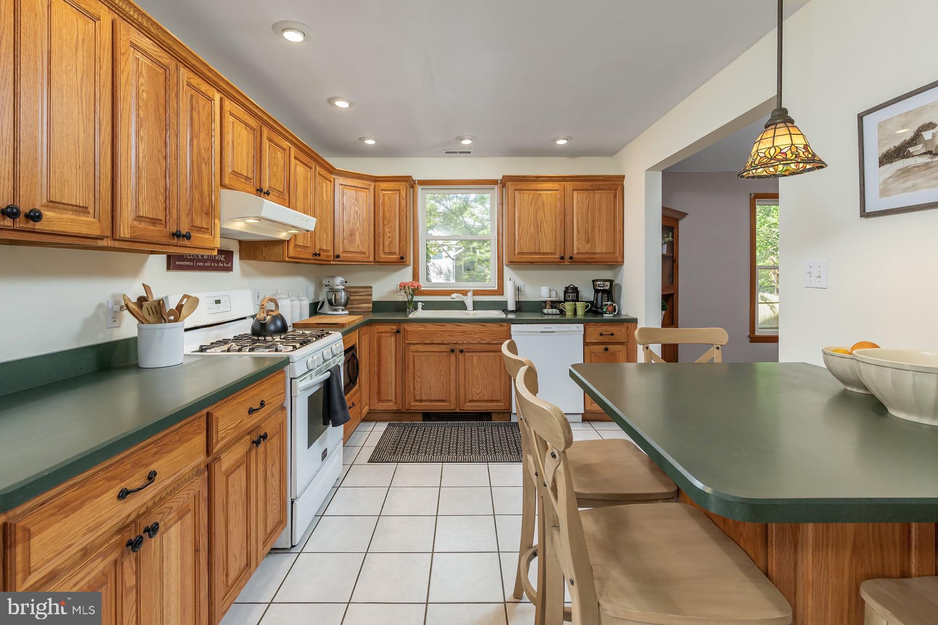 24 Kirkwood Road Gibbsboro, NJ 08026 - Photo 7 of 34 Kitchen with recessed lighting and oak cabinets