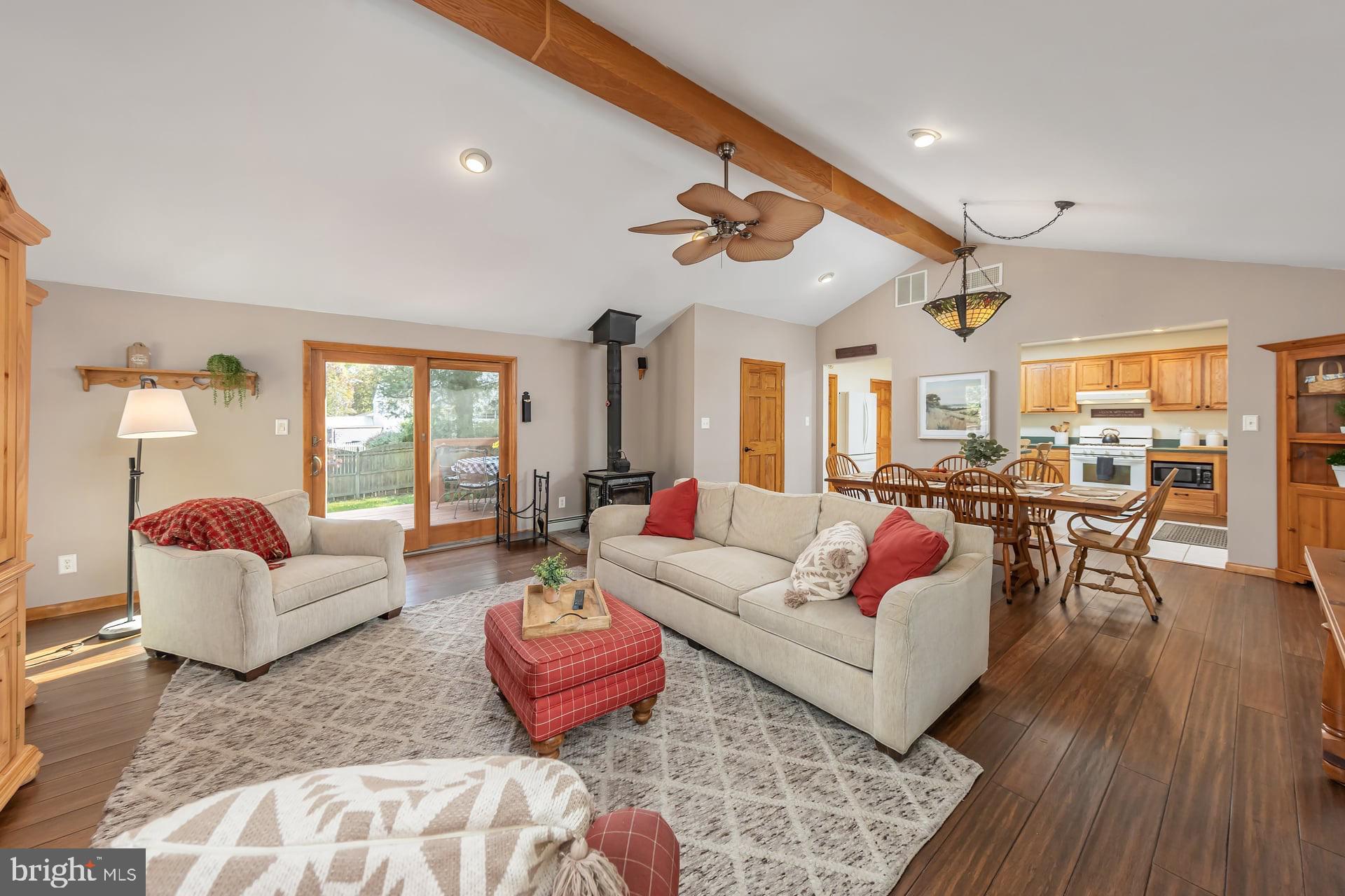 24 Kirkwood Road Gibbsboro, NJ 08026 - Photo 9 of 34 Family room, wood burning stove, patio door