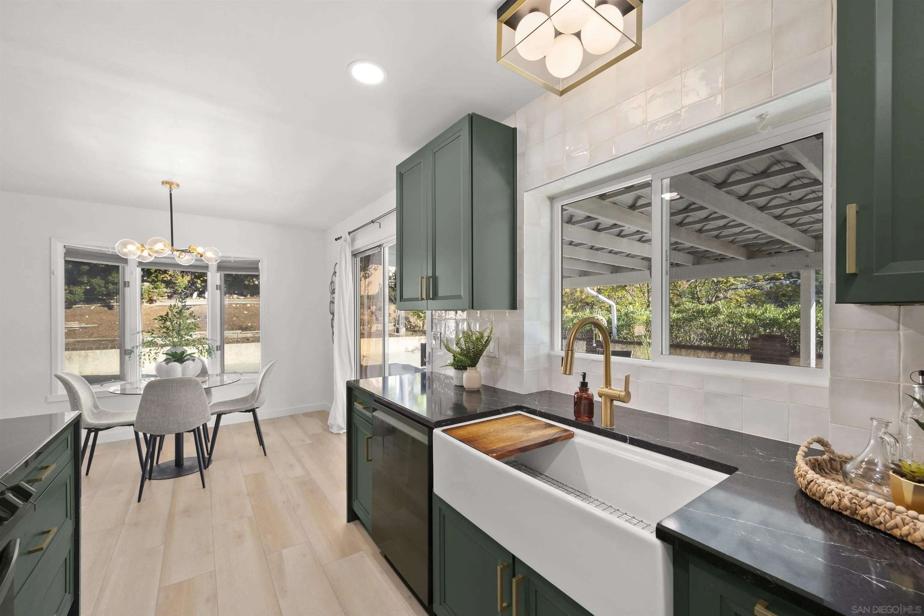 2321 Farrington Drive El Cajon, CA 92020 - Photo 1 of 47 a view of a dining room with furniture window and outside view