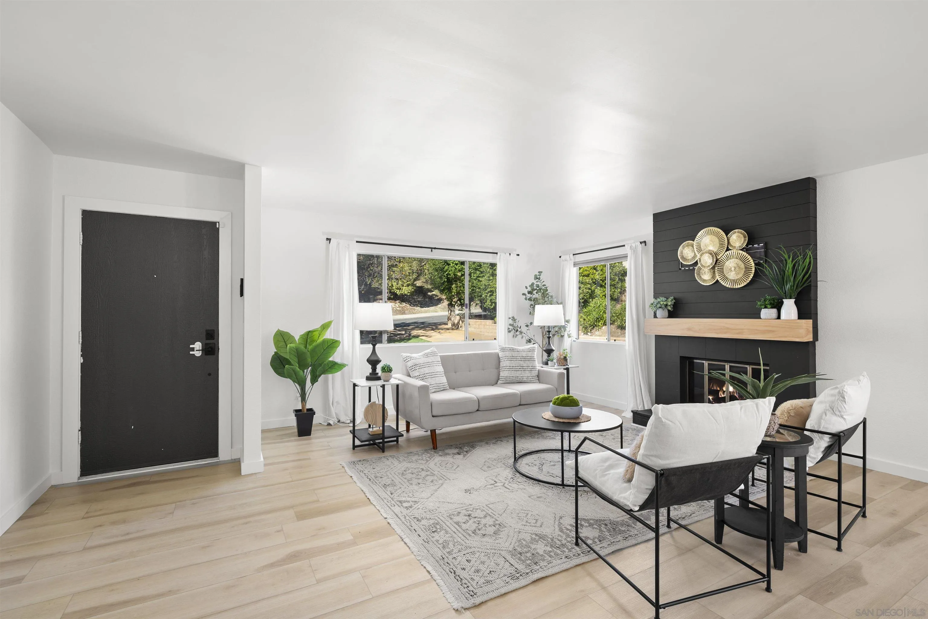 2321 Farrington Drive El Cajon, CA 92020 - Photo 13 of 47 a living room with furniture a rug and white walls
