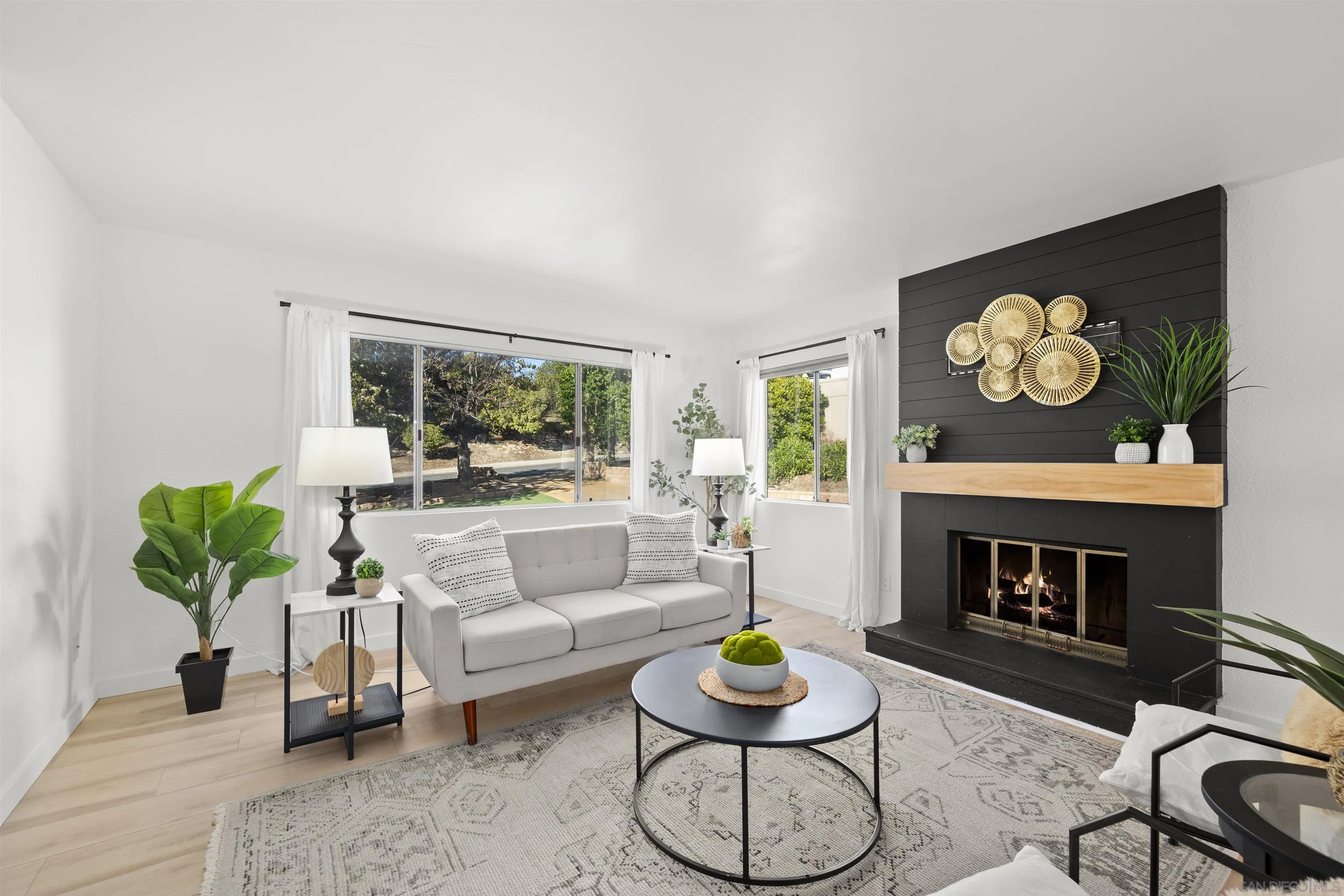 2321 Farrington Drive El Cajon, CA 92020 - Photo 17 of 47 a living room with furniture and a fireplace