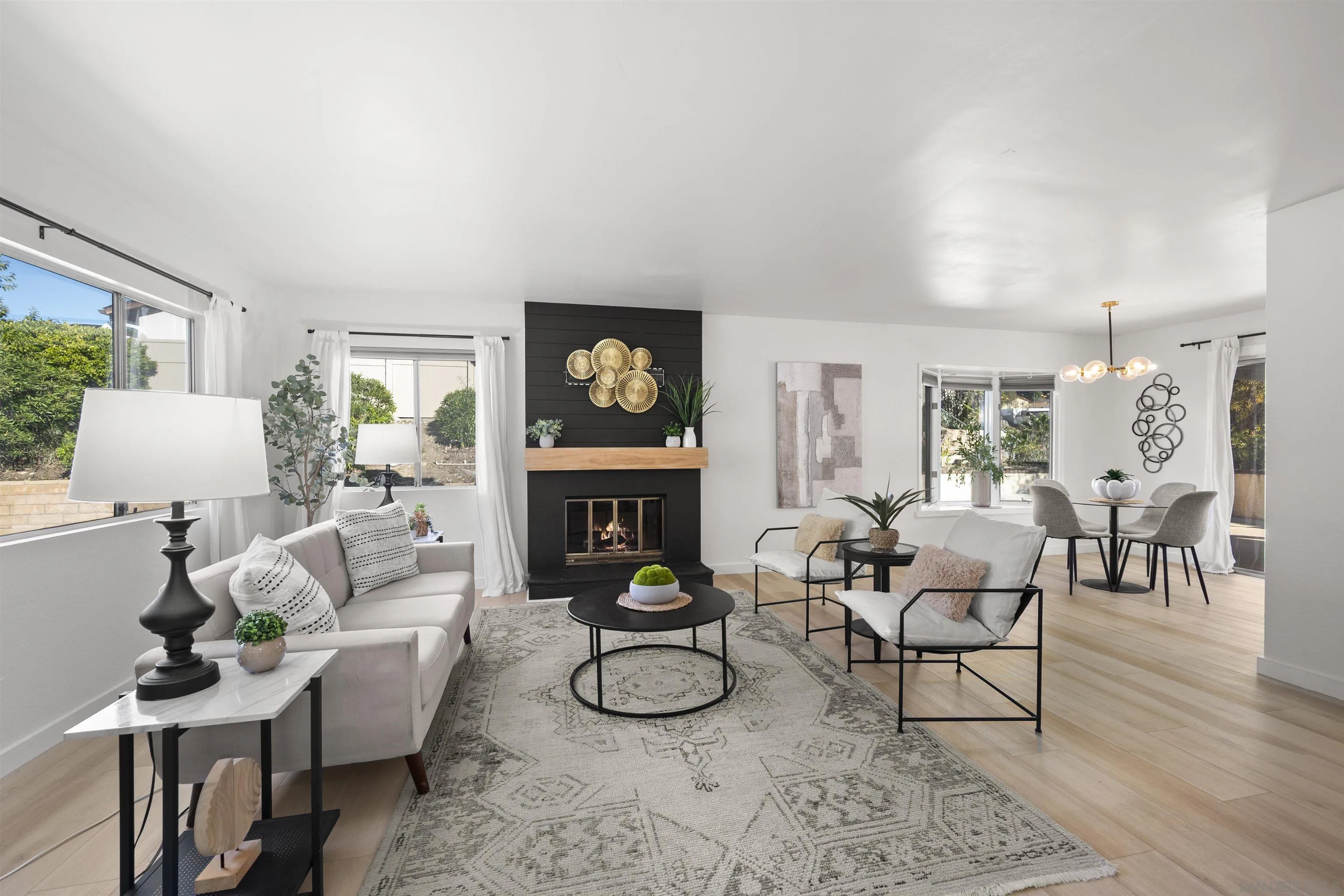 2321 Farrington Drive El Cajon, CA 92020 - Photo 18 of 47 a living room with furniture a fireplace and a table