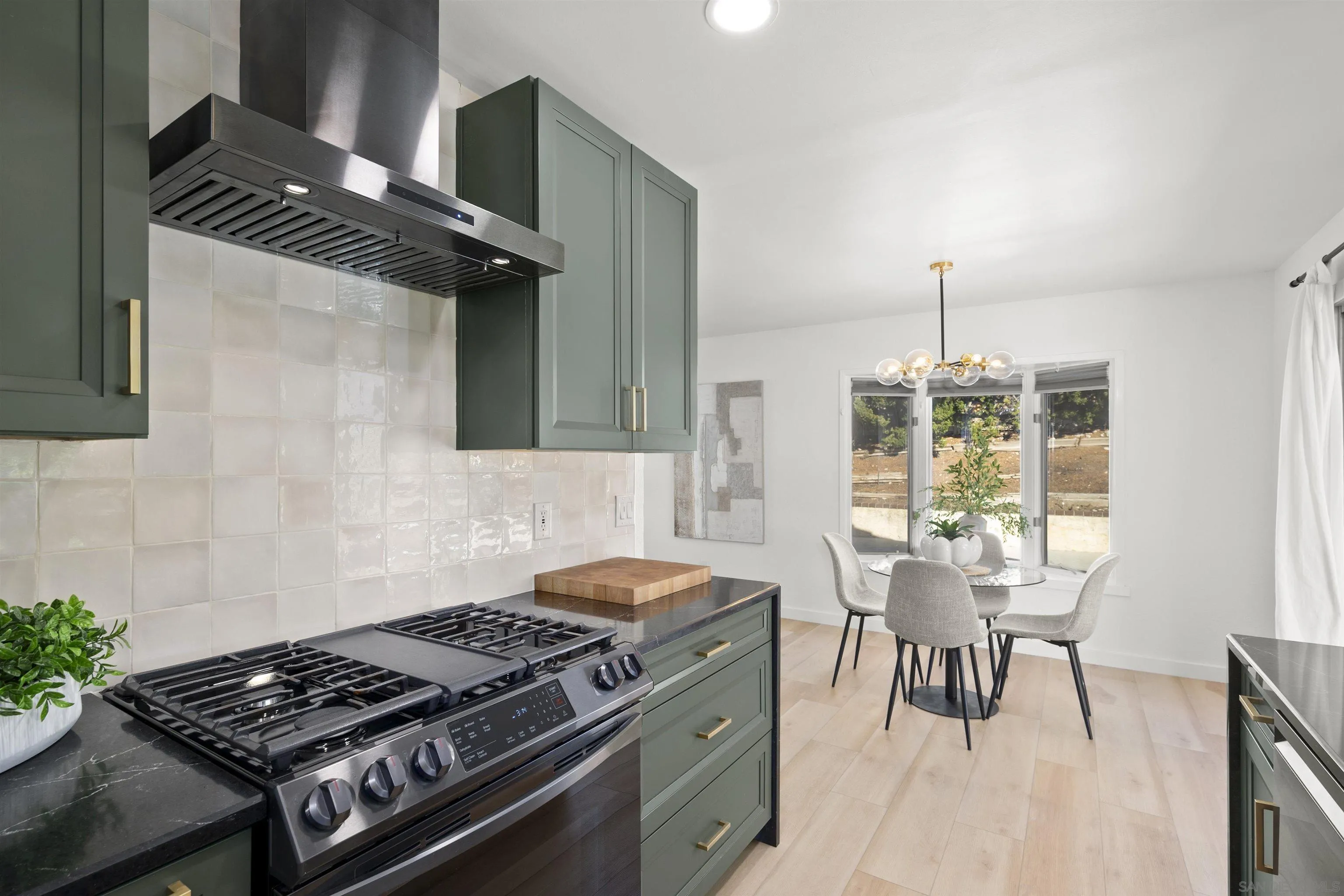 2321 Farrington Drive El Cajon, CA 92020 - Photo 25 of 47 a kitchen with a stove and a window