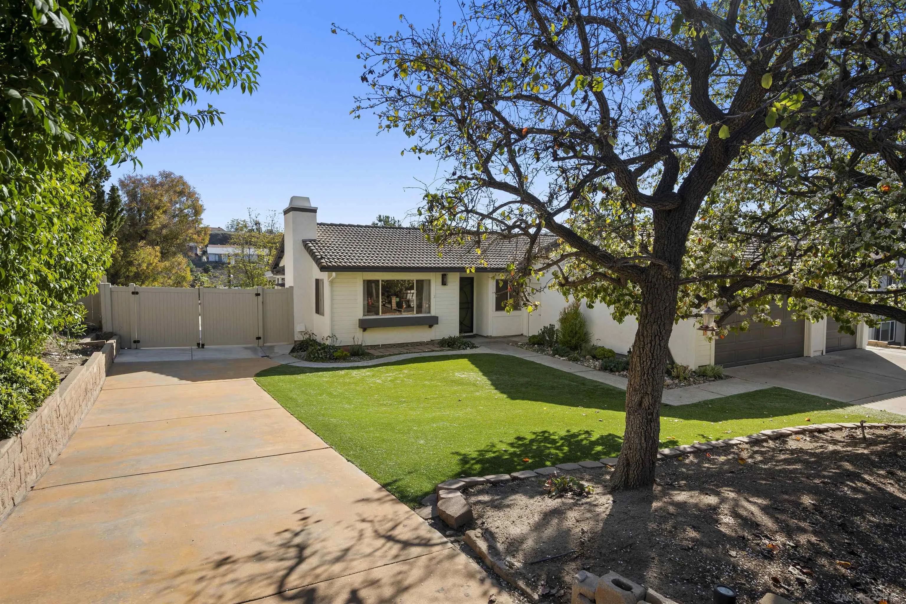 2321 Farrington Drive El Cajon, CA 92020 - Photo 45 of 47 a front view of a house with garden