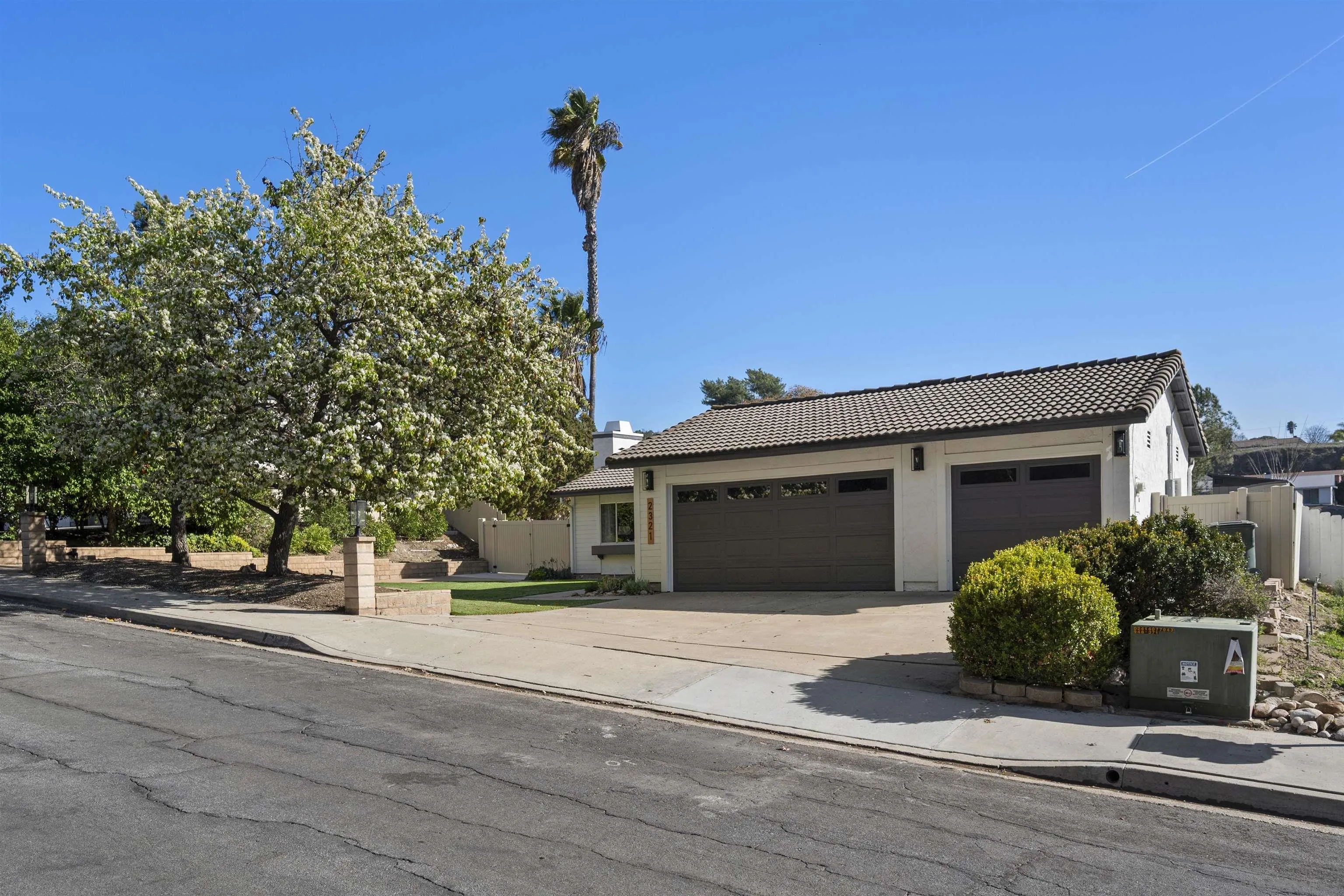 2321 Farrington Drive El Cajon, CA 92020 - Photo 5 of 47 a front view of a house with a garden