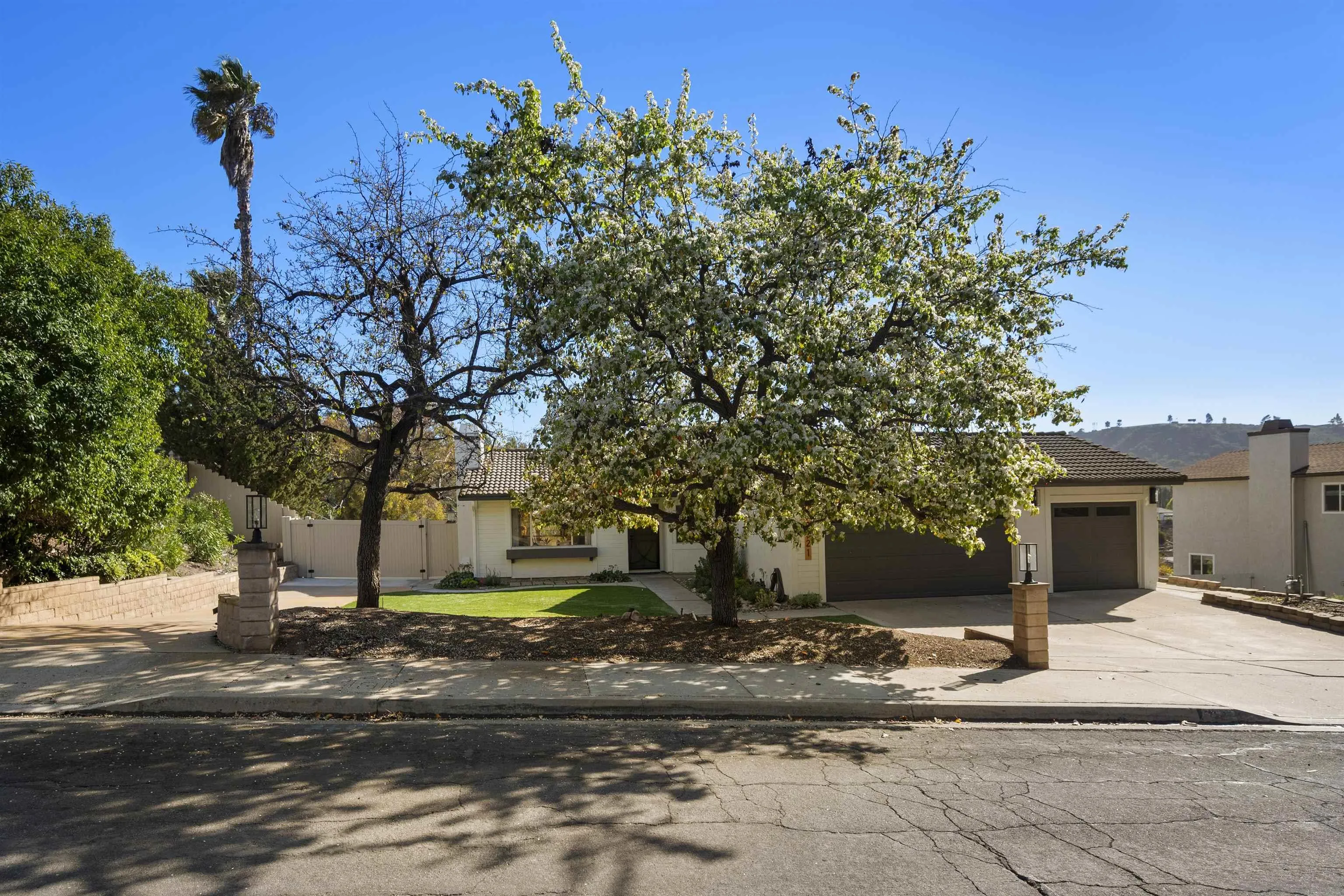 2321 Farrington Drive El Cajon, CA 92020 - Photo 6 of 47 a front view of a house with a yard