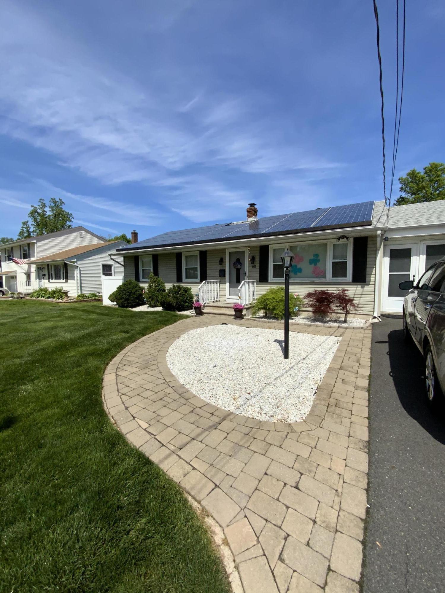 151 Ravine Drive Matawan, NJ 07747 - Photo 2 of 23 a swimming pool with outdoor seating and yard