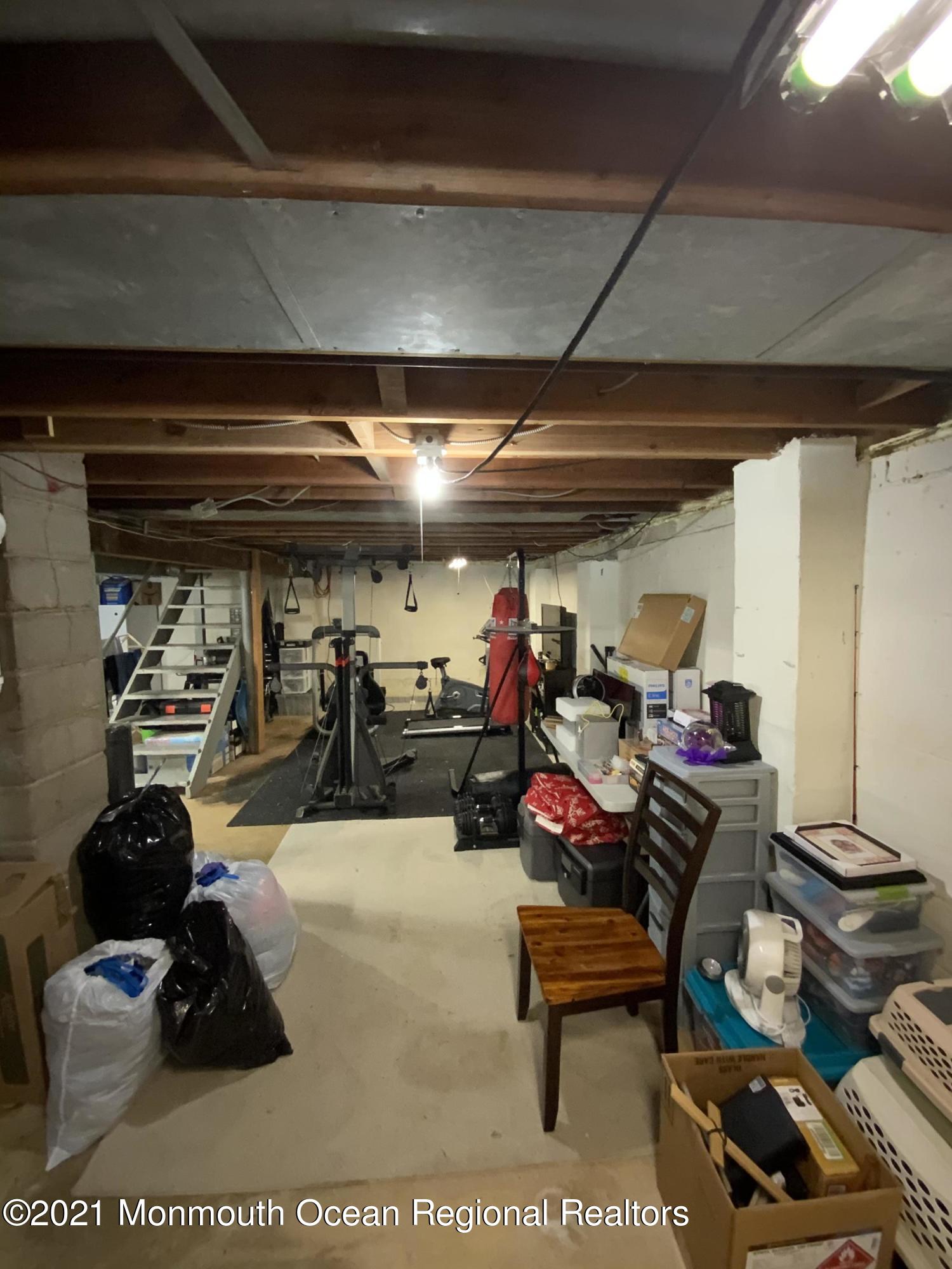 151 Ravine Drive Matawan, NJ 07747 - Photo 22 of 23 a view of a room with lots of stuff