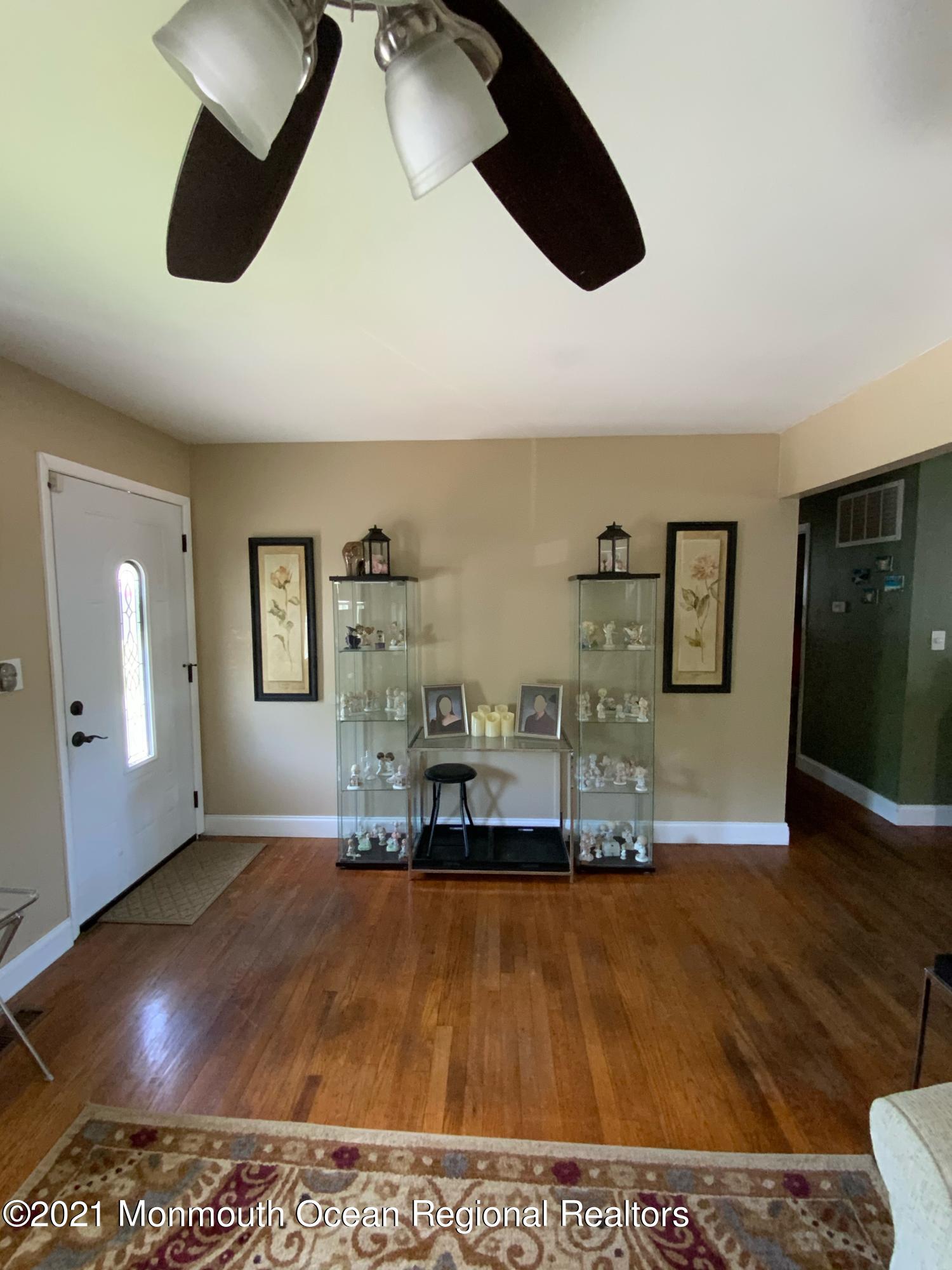 151 Ravine Drive Matawan, NJ 07747 - Photo 6 of 23 a living room with furniture