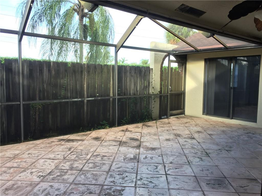 8951 Southwest 19th Street, Unit H Boca Raton, FL 33433 - Photo 23 of 31 Screened Patio