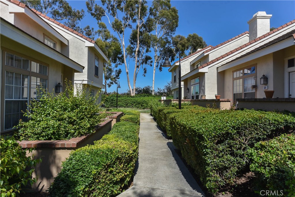 55 Wellesley, Unit 55 Irvine, CA 92612 - Photo 5 of 11 a view of a garden with pathway