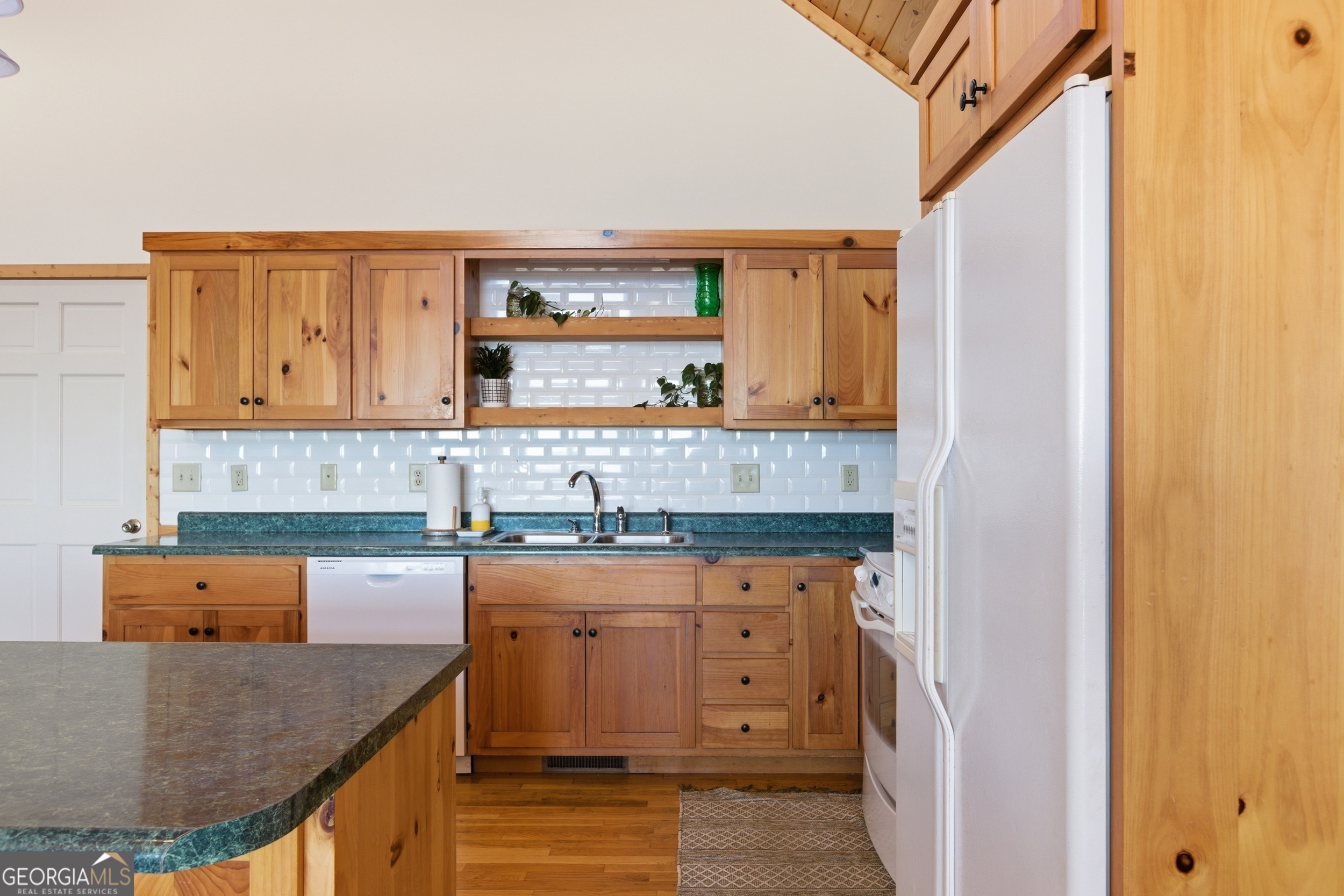 2280 Germany Road Clayton, GA 30525 - Photo 13 of 70 a kitchen with granite countertop white cabinets and window