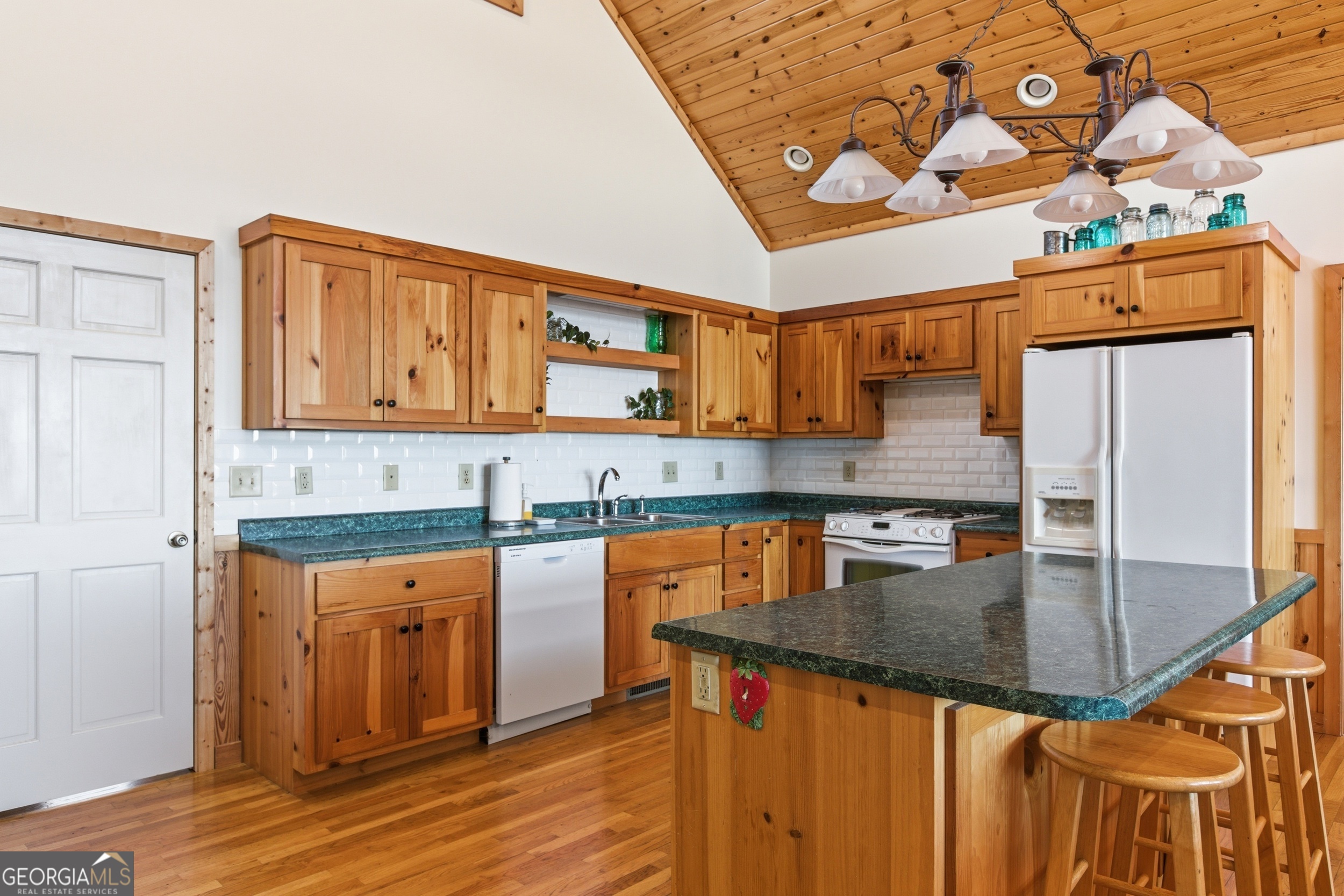 2280 Germany Road Clayton, GA 30525 - Photo 14 of 70 a kitchen with stainless steel appliances granite countertop a sink a stove counter space and cabinets