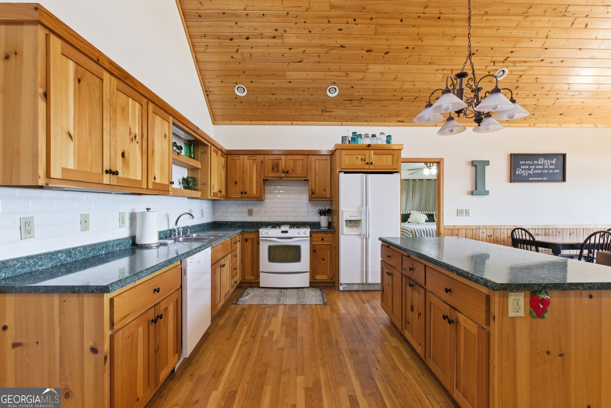 2280 Germany Road Clayton, GA 30525 - Photo 15 of 70 a kitchen with stainless steel appliances granite countertop a sink and cabinets