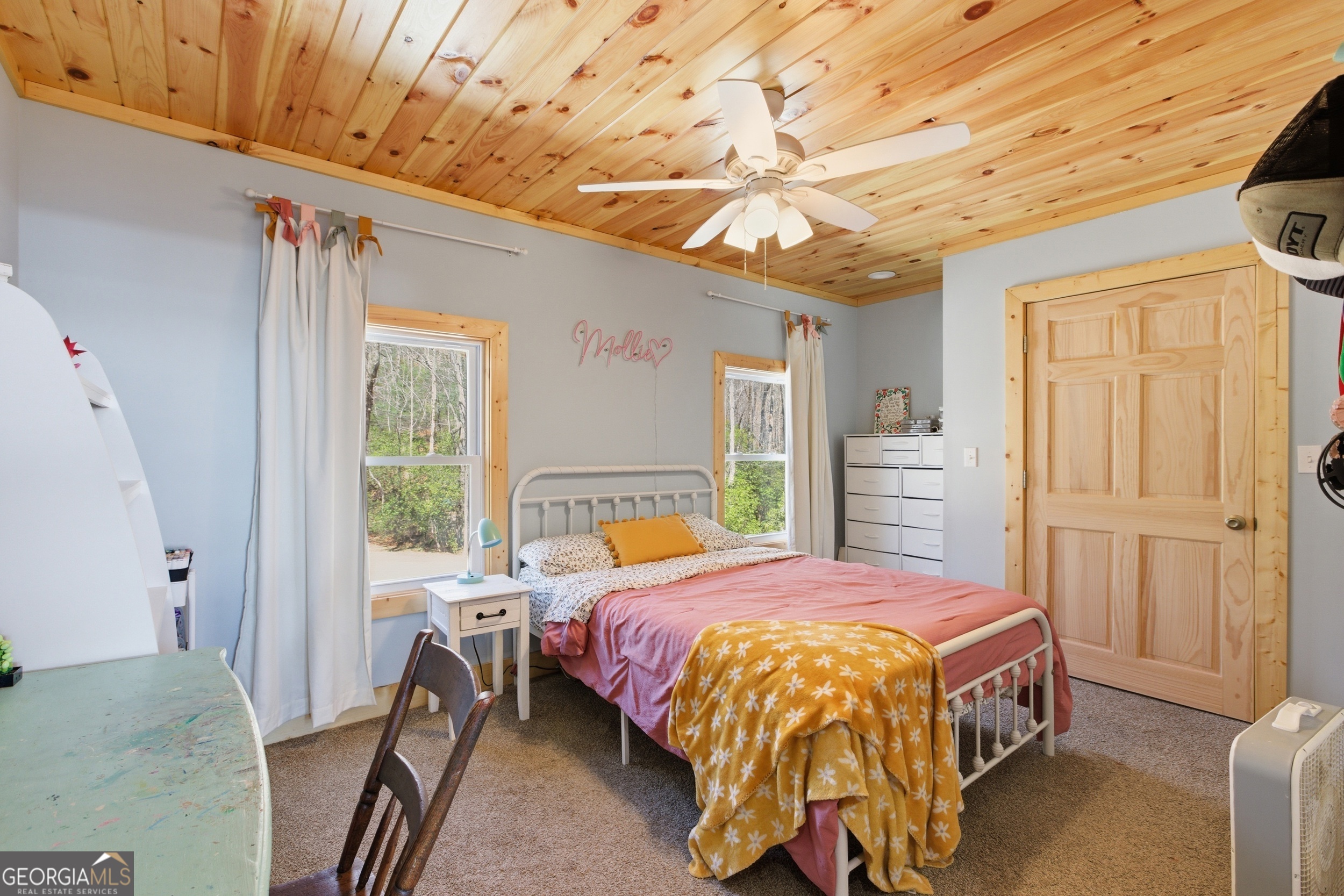 2280 Germany Road Clayton, GA 30525 - Photo 22 of 70 a bed sitting in a bedroom next to a window