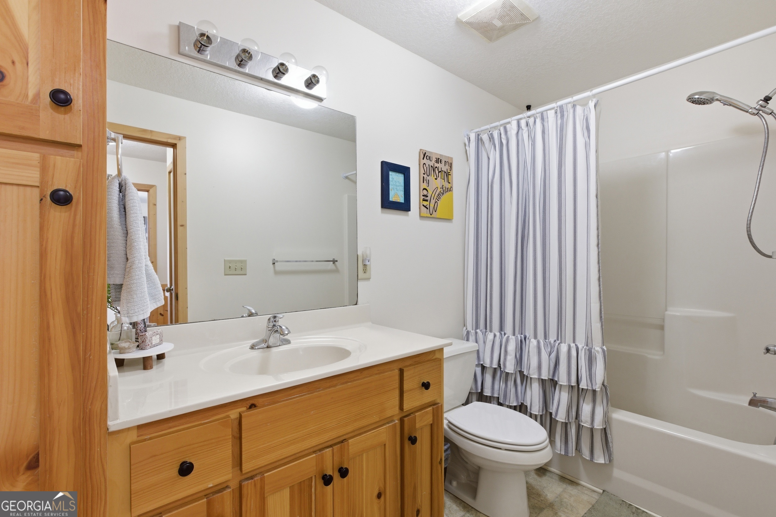 2280 Germany Road Clayton, GA 30525 - Photo 28 of 70 a bathroom with a sink toilet and shower