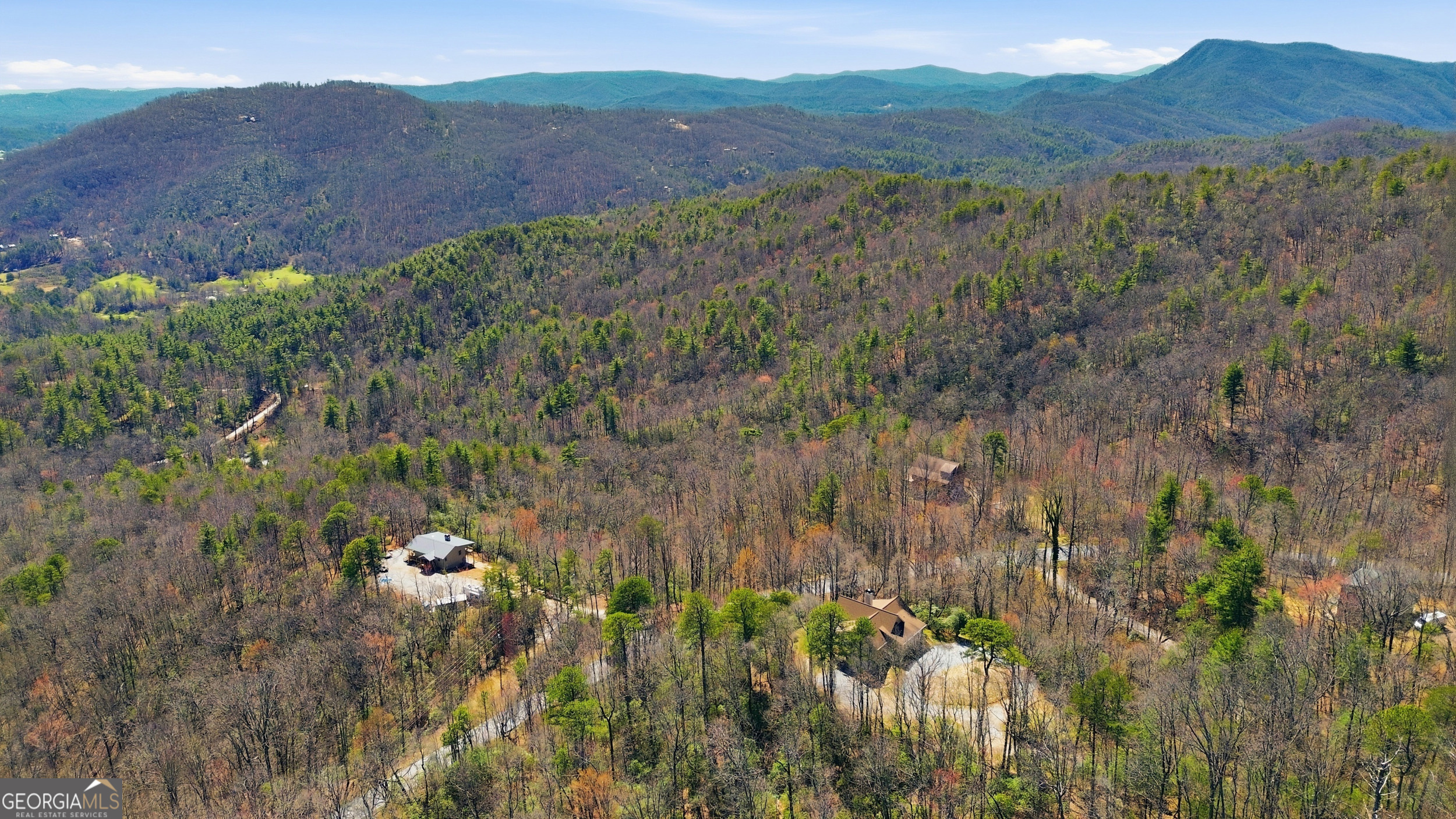 2280 Germany Road Clayton, GA 30525 - Photo 43 of 70 a view of a lush green hillside and a building