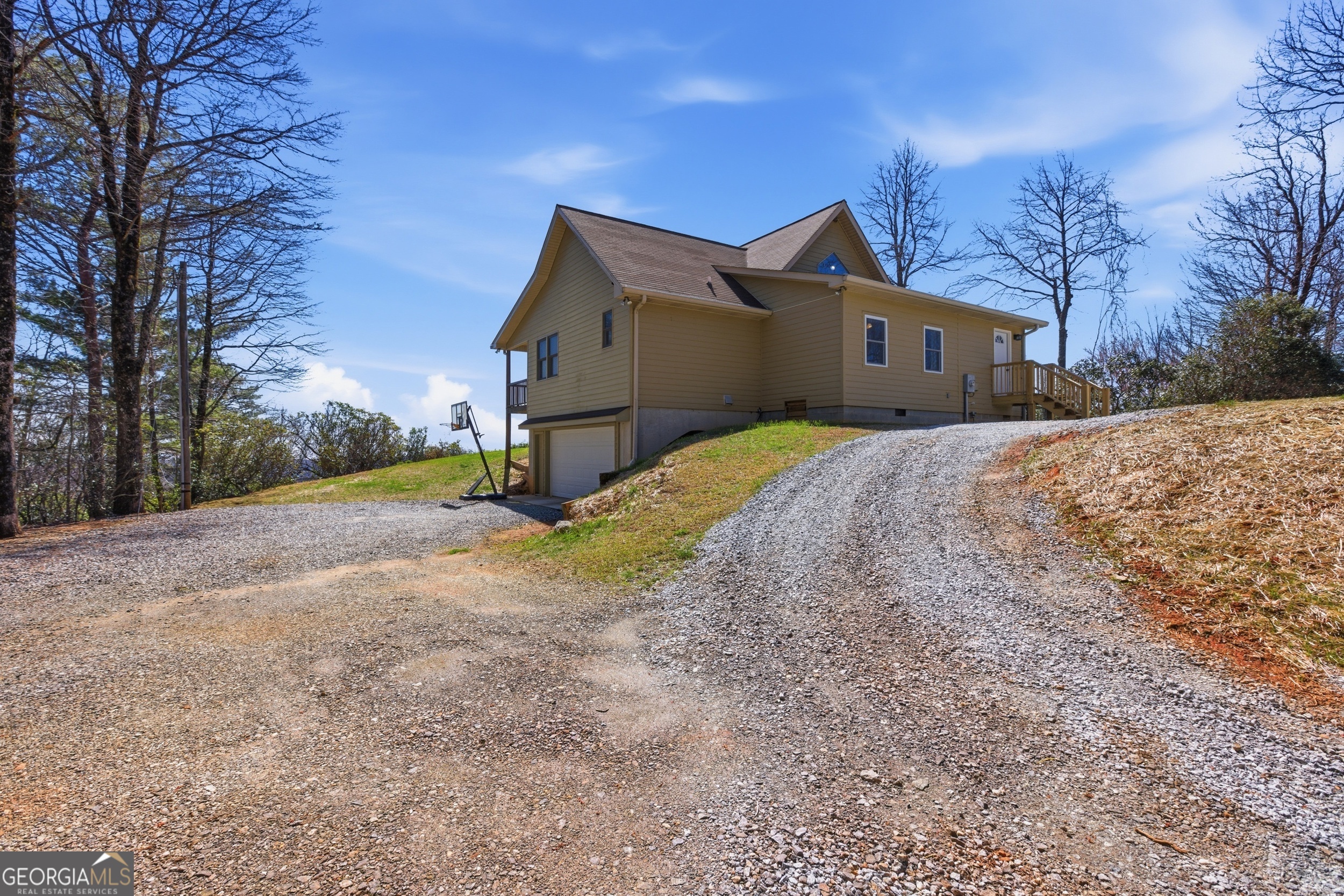 2280 Germany Road Clayton, GA 30525 - Photo 55 of 70 a front view of a house with a yard and garage