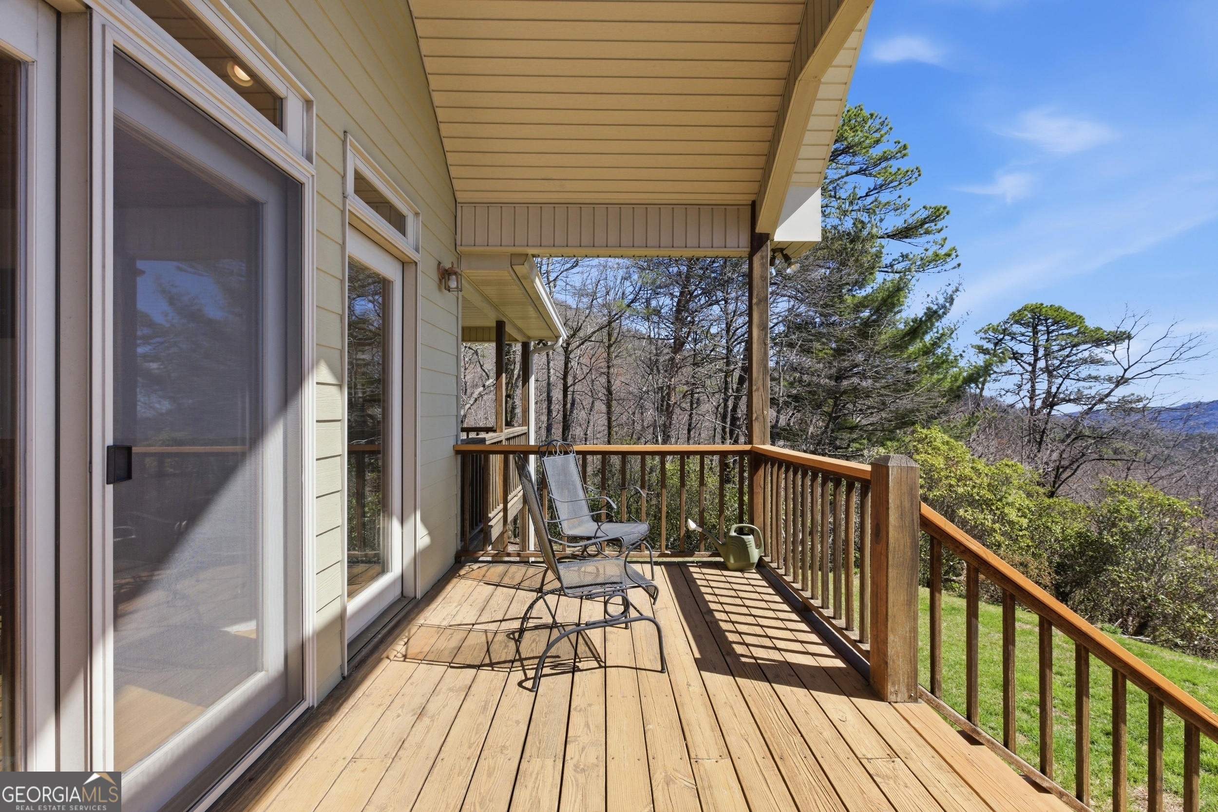 2280 Germany Road Clayton, GA 30525 - Photo 61 of 70 a view of balcony with wooden floor and fence and floor to ceiling window