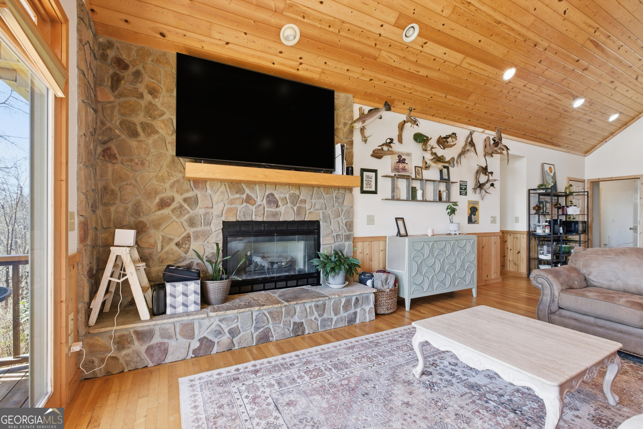 2280 Germany Road Clayton, GA 30525 - Photo 7 of 70 a living room with furniture and a flat screen tv