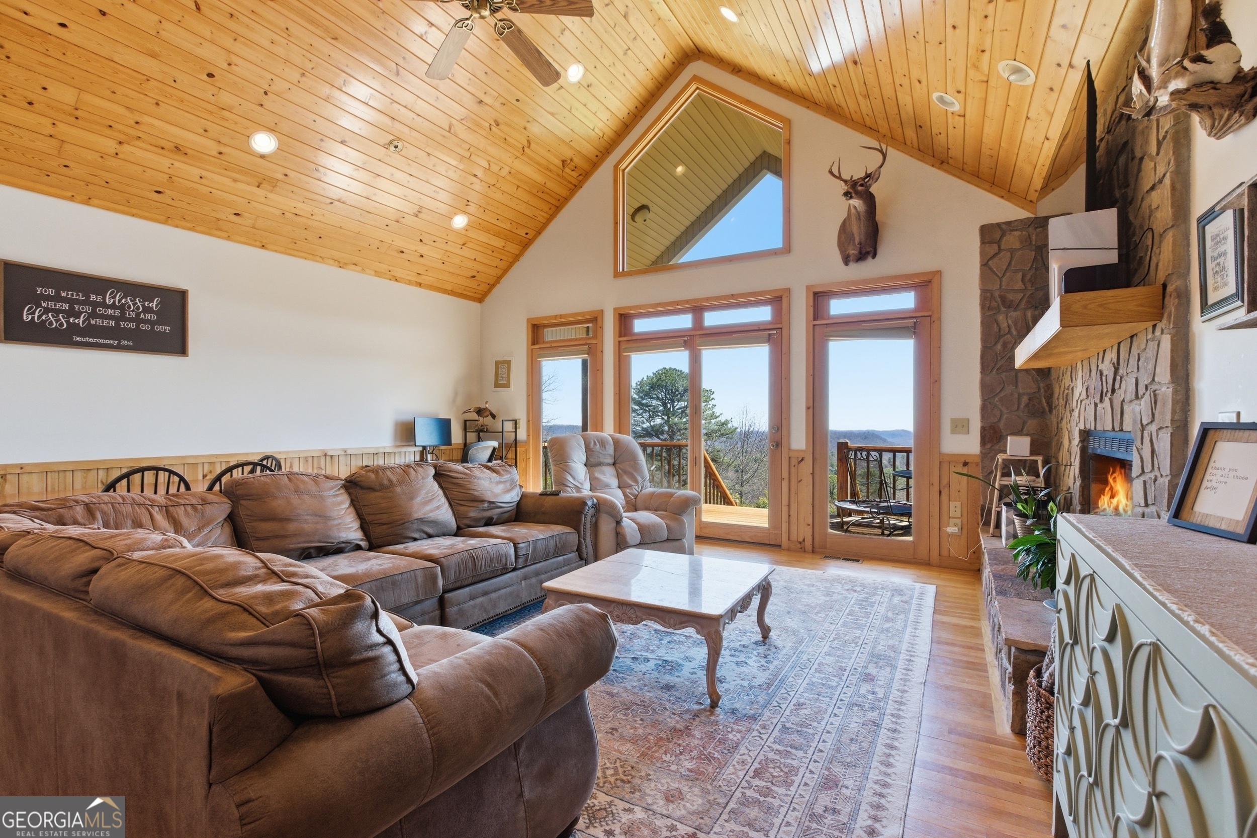2280 Germany Road Clayton, GA 30525 - Photo 9 of 70 a living room with furniture a rug and a large window