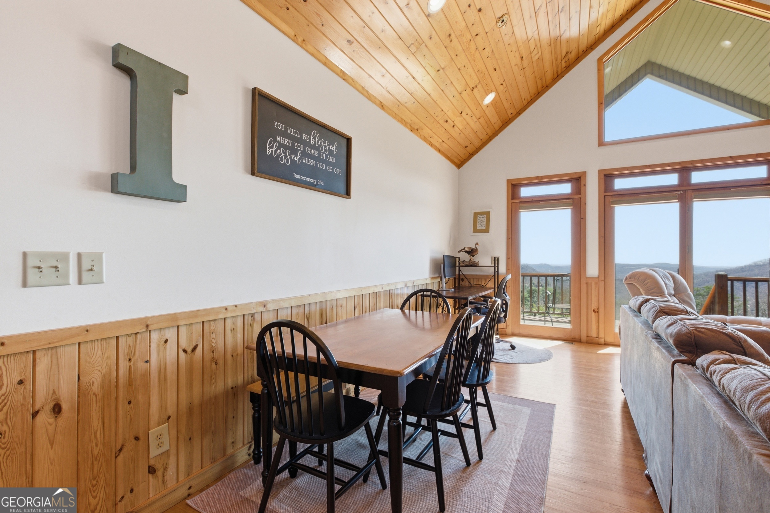 2280 Germany Road Clayton, GA 30525 - Photo 10 of 70 a view of a dining room with furniture large windows and wooden floor